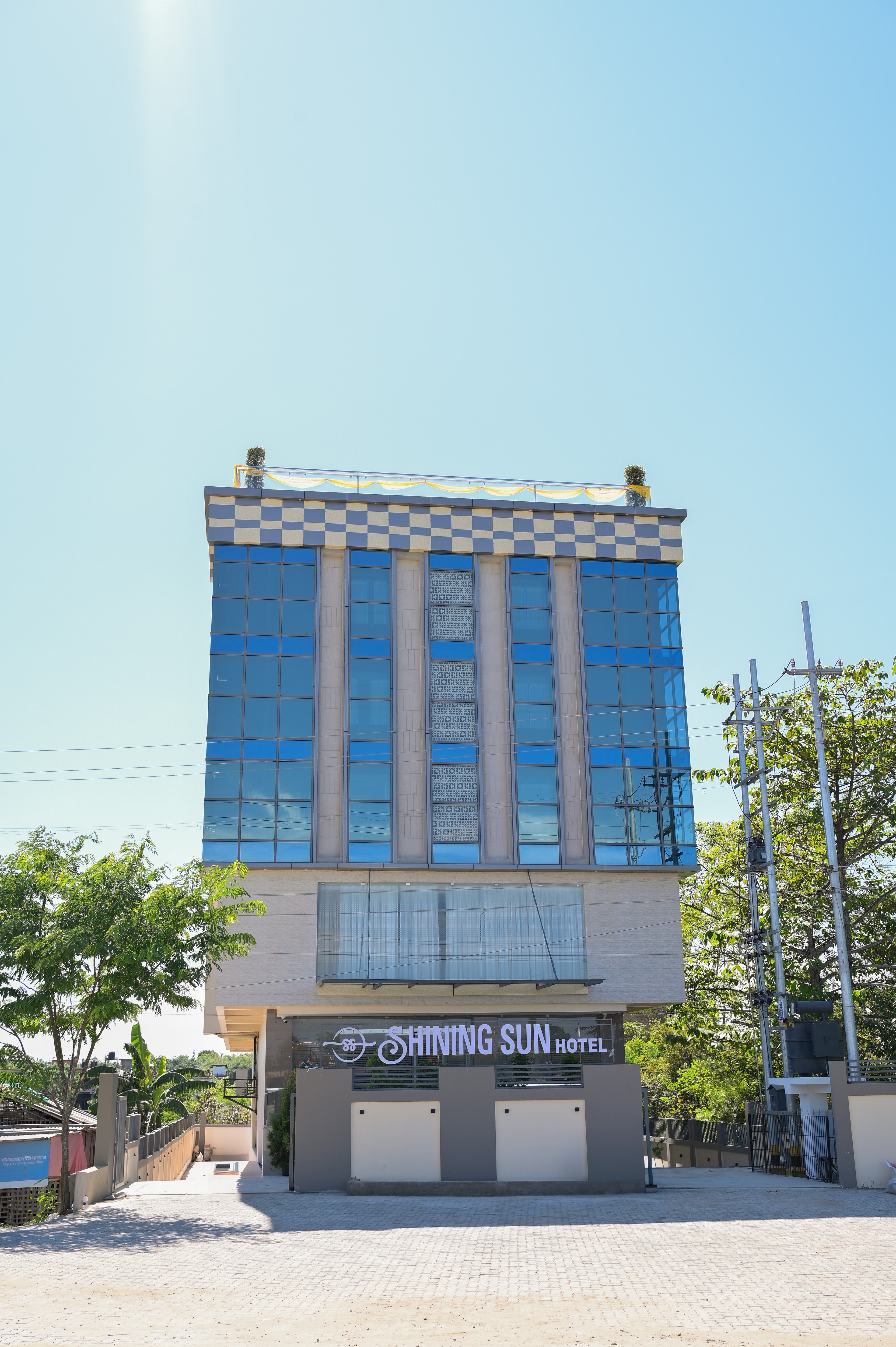 Luxury hotel exterior with golden lighting